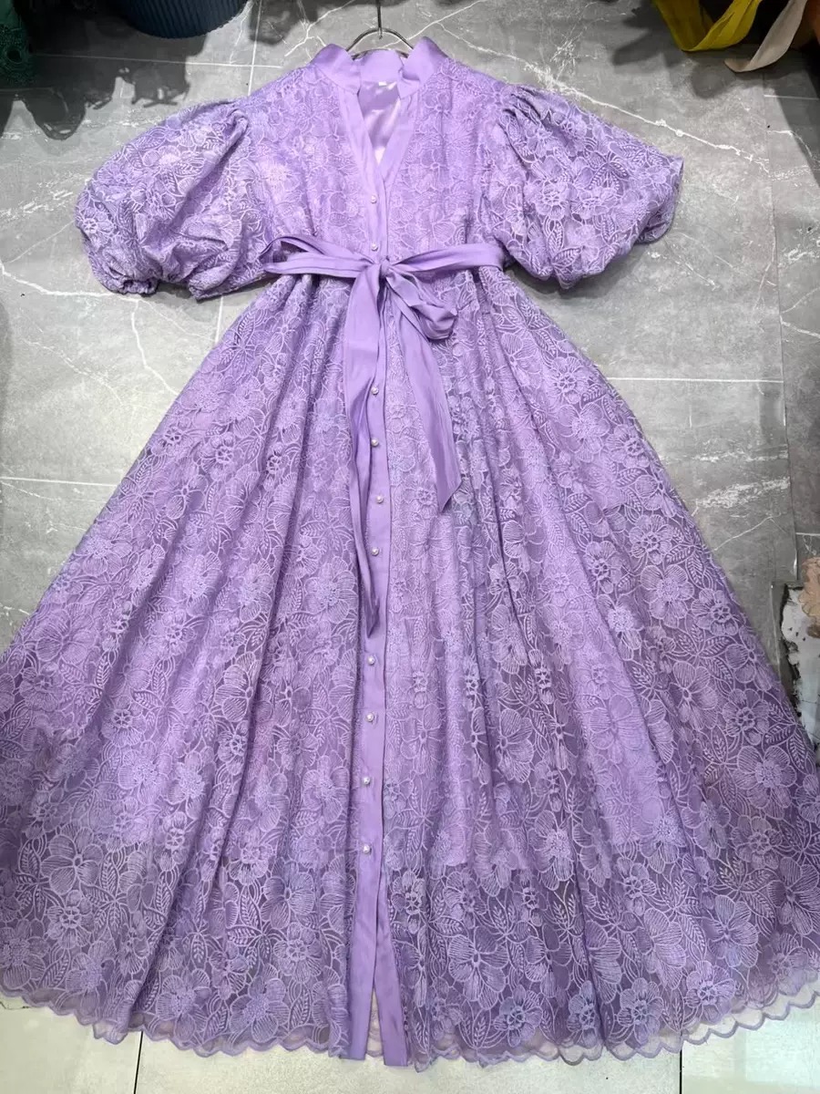 Less dress with a slimming waist  crochet openwork sleeves